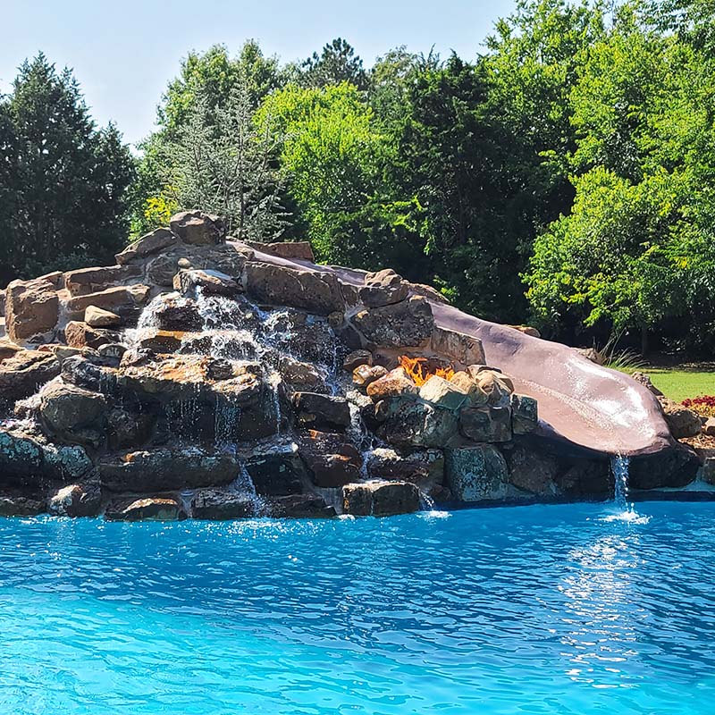 Firepit Waterfall Slide Pool 2 OKC | Dunford Pools